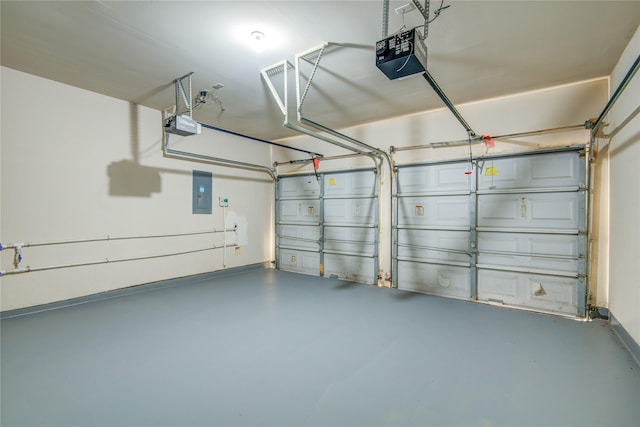 garage with electric panel and a garage door opener