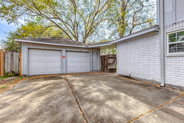 garage with fence