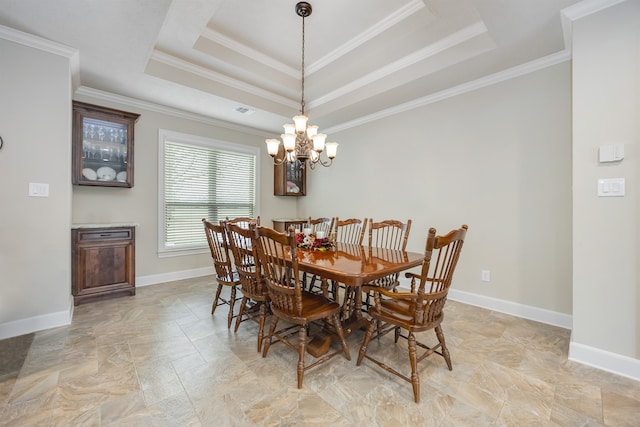 dining room featuring visible vents, a raised ceiling, crown molding, baseboards, and a chandelier