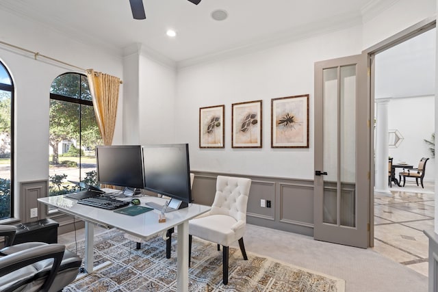 home office with recessed lighting, a decorative wall, wainscoting, and crown molding