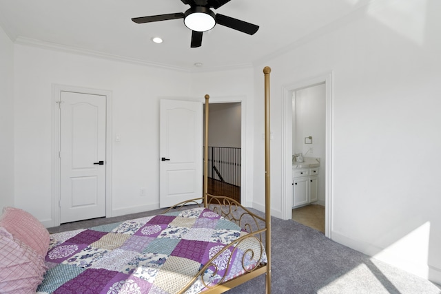 bedroom with baseboards, carpet floors, ornamental molding, and ensuite bathroom