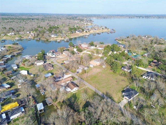 aerial view with a water view and a residential view