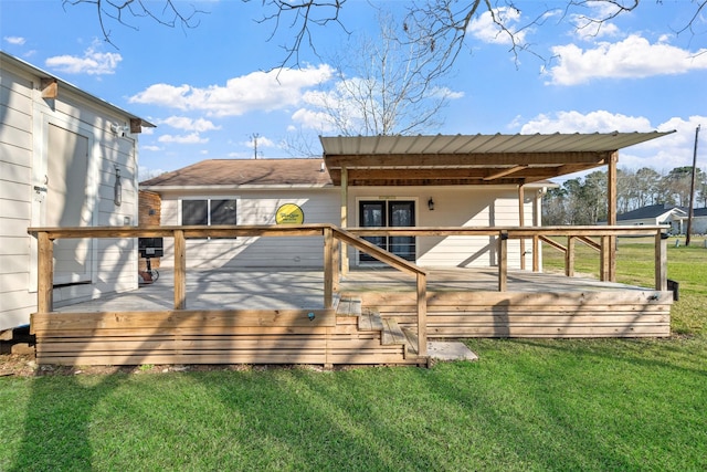 rear view of property with a yard