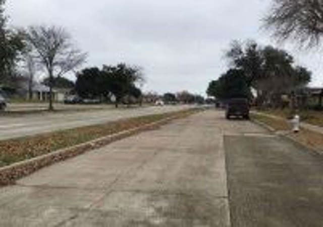 view of road featuring sidewalks