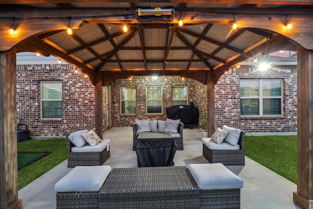 view of patio / terrace featuring a grill, an outdoor living space, and a gazebo