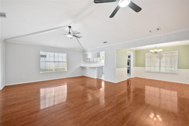 unfurnished living room with ceiling fan with notable chandelier, wood finished floors, visible vents, and vaulted ceiling with beams