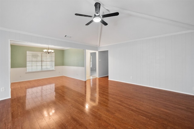 unfurnished room featuring crown molding, visible vents, vaulted ceiling, wood finished floors, and ceiling fan with notable chandelier