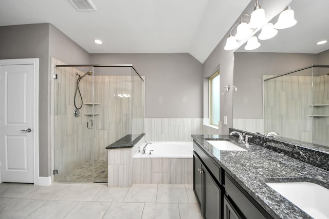 bathroom with visible vents, a sink, a shower stall, a bath, and tile patterned floors