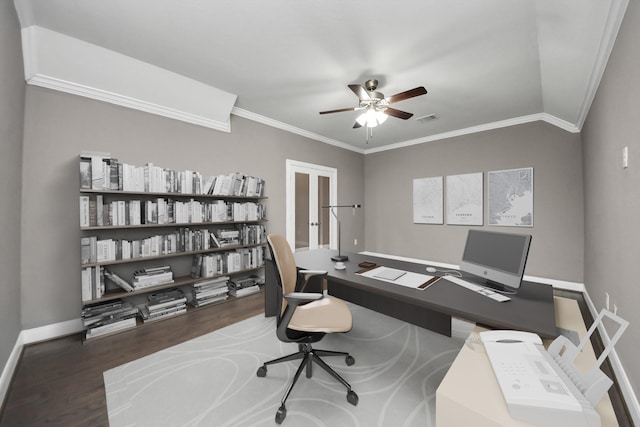 office with visible vents, a ceiling fan, ornamental molding, wood finished floors, and baseboards