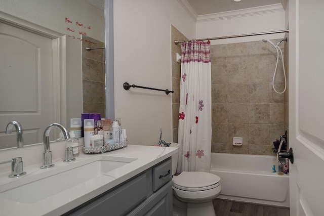 bathroom with toilet, wood finished floors, shower / bathtub combination with curtain, crown molding, and vanity