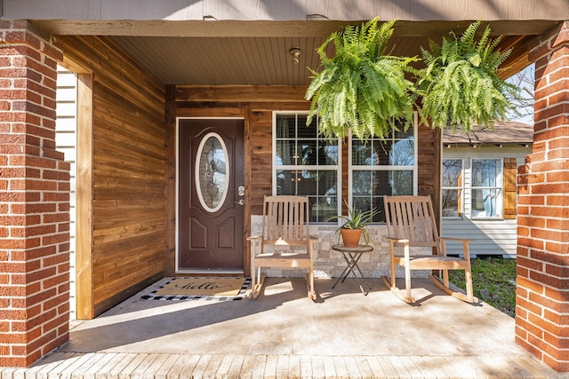 doorway to property featuring a porch