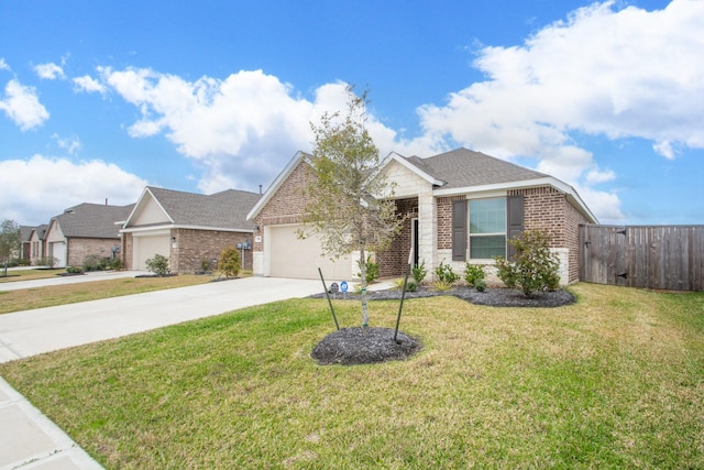 view of front of home with a front yard, fence, driveway, a garage, and brick siding