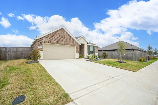 ranch-style home with fence, concrete driveway, an attached garage, a front yard, and brick siding