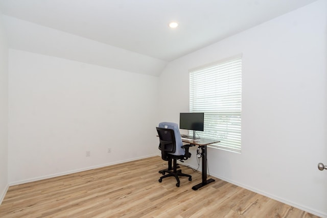 office area featuring recessed lighting, baseboards, lofted ceiling, and wood finished floors