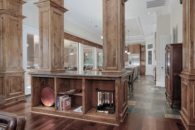 interior space with crown molding, decorative columns, recessed lighting, and visible vents