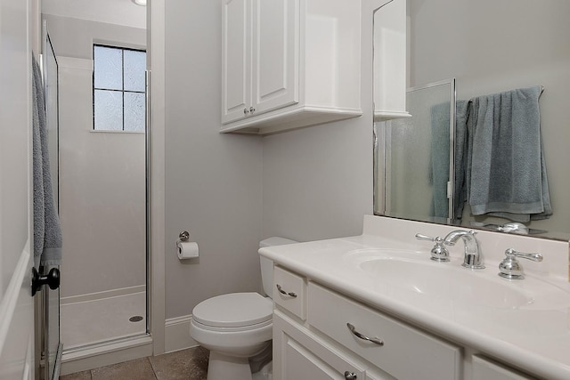 full bathroom featuring tile patterned floors, toilet, a stall shower, and vanity