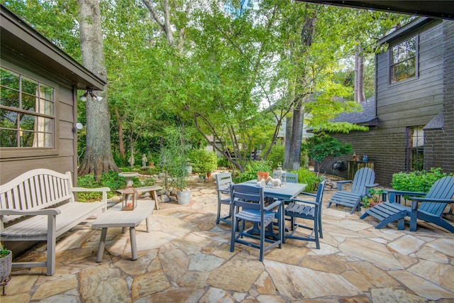 view of patio featuring outdoor dining area