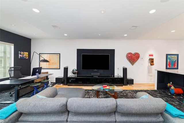 living area featuring wood finished floors, visible vents, and recessed lighting