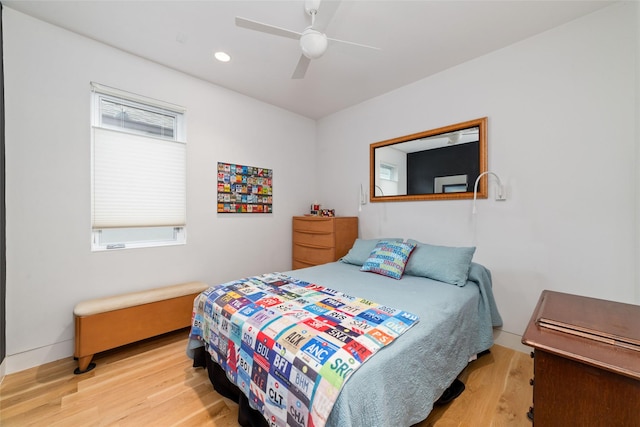 bedroom with recessed lighting, ceiling fan, and wood finished floors