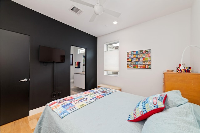 bedroom with recessed lighting, wood finished floors, visible vents, and a ceiling fan