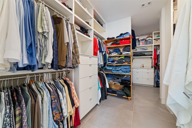 spacious closet with tile patterned flooring and visible vents