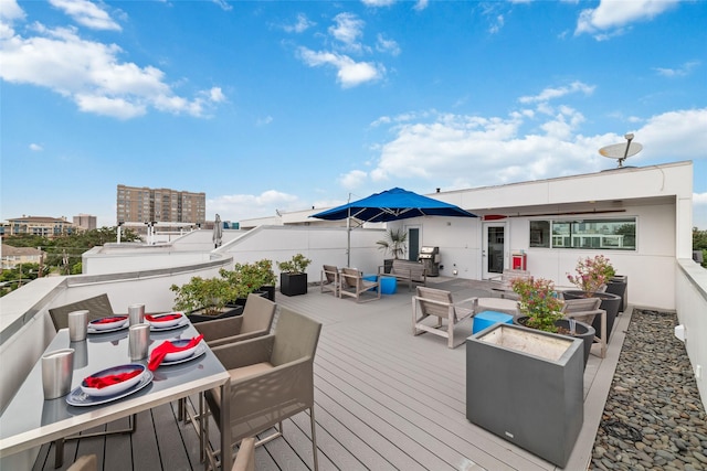 wooden deck featuring outdoor lounge area