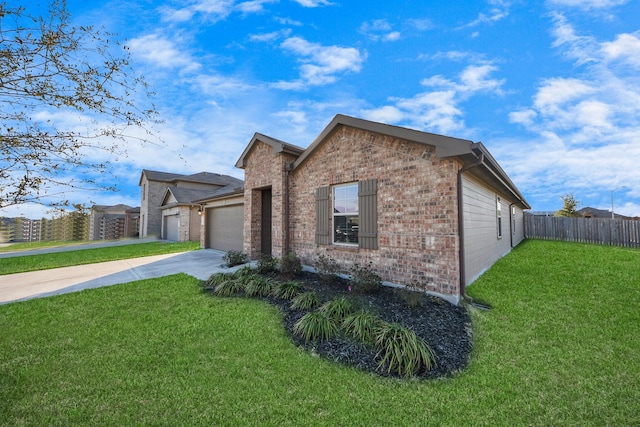 view of side of property featuring driveway, a lawn, an attached garage, fence, and brick siding