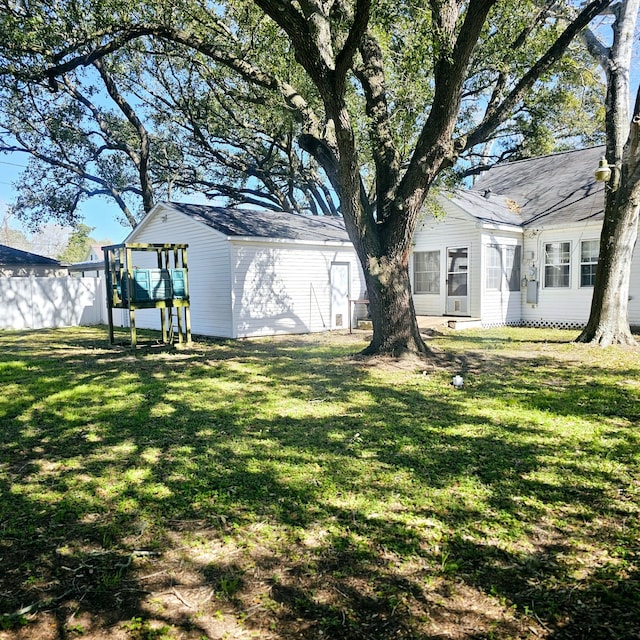 view of yard featuring fence