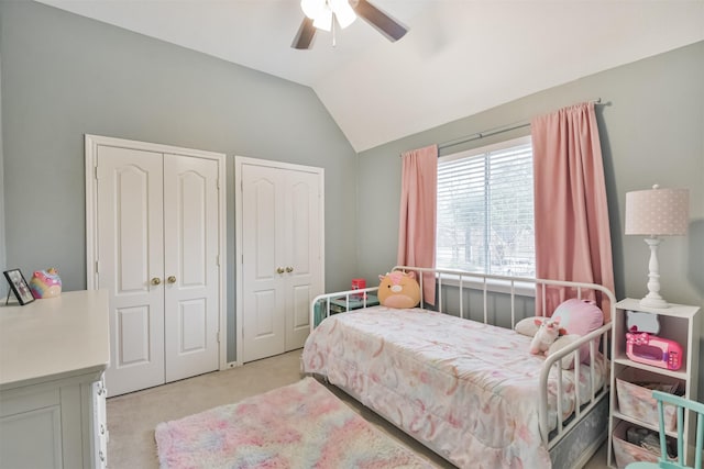 1731 Red Oak Ter, Houston, TX 77339 - bedroom with multiple closets, carpet flooring, lofted ceiling, and a ceiling fan
