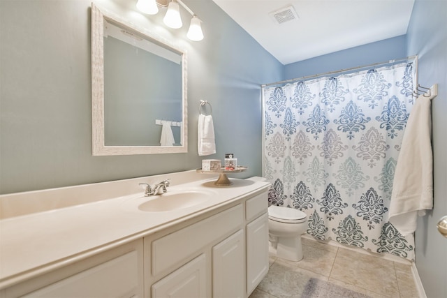 full bath with a shower with curtain, visible vents, toilet, vanity, and tile patterned flooring