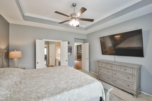 bedroom with baseboards, a raised ceiling, crown molding, and light colored carpet