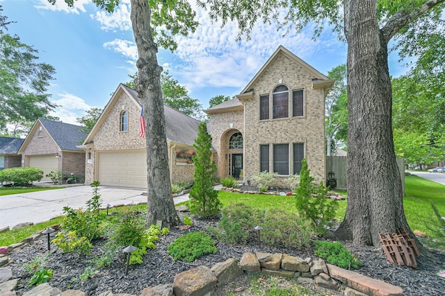 1731 Red Oak Ter, Houston, TX 77339 - traditional-style home featuring brick siding, driveway, and a garage