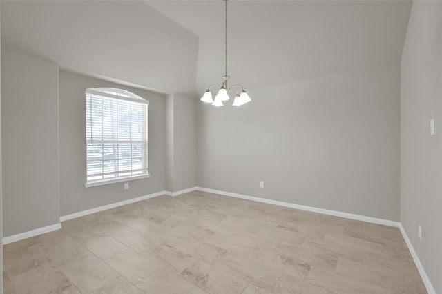 spare room with baseboards and a notable chandelier