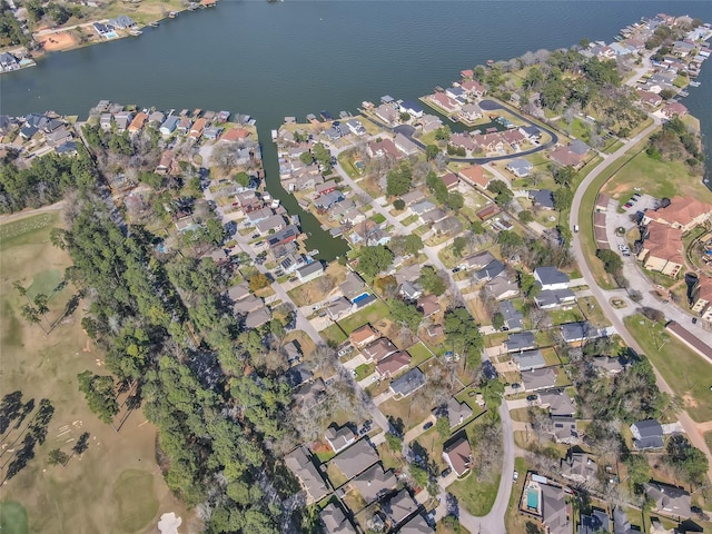 birds eye view of property featuring a water view and a residential view