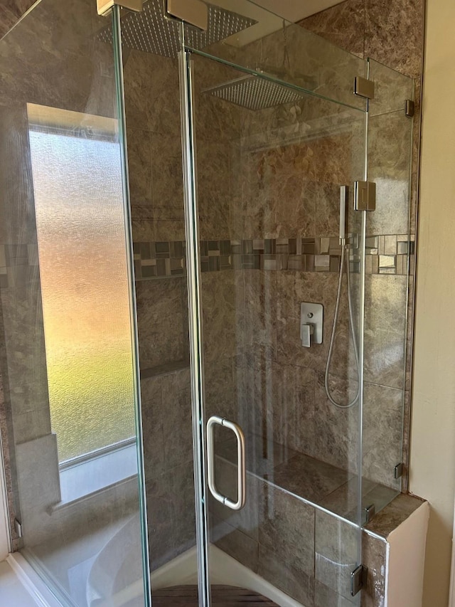 full bathroom with a stall shower