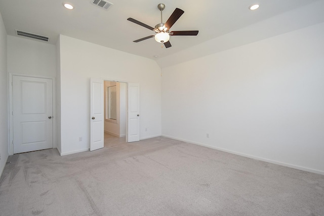 unfurnished bedroom featuring recessed lighting, visible vents, and light colored carpet