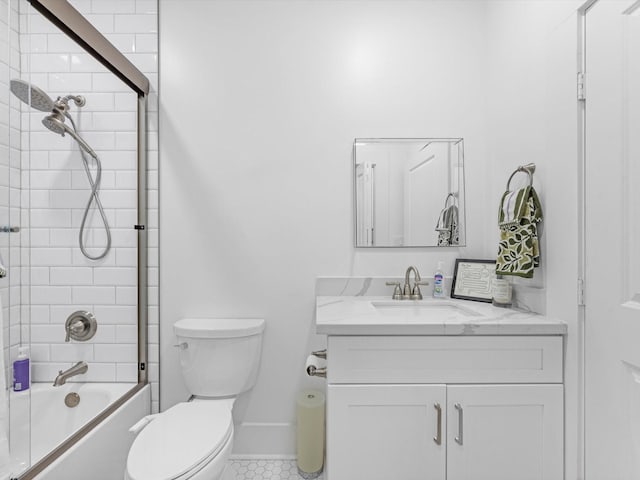 bathroom with baseboards, shower / tub combination, vanity, and toilet