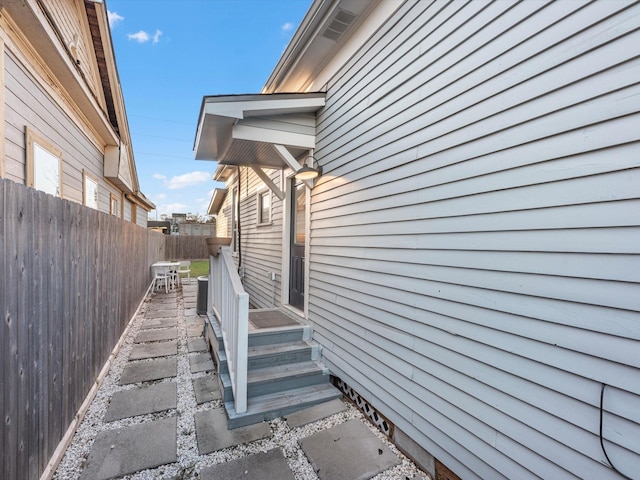 view of property exterior with fence