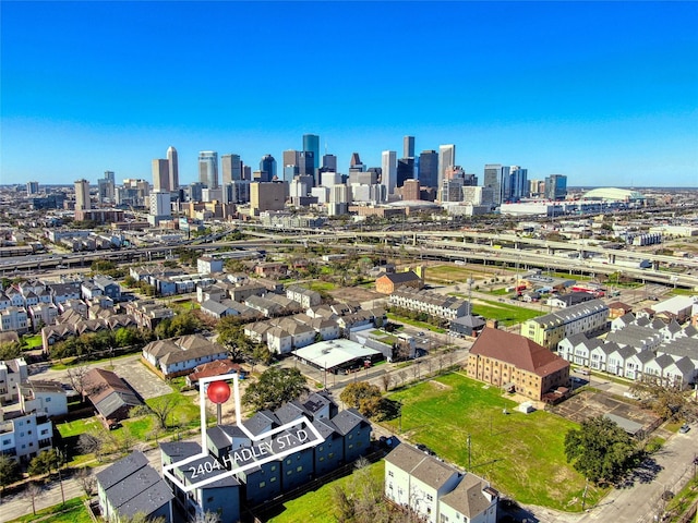 birds eye view of property featuring a view of city