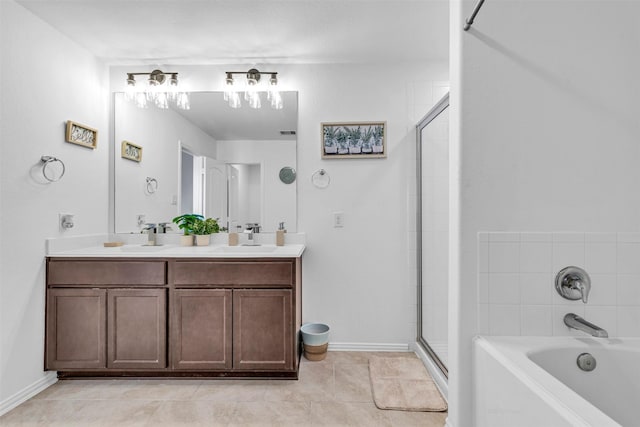 full bathroom featuring double vanity, a garden tub, tile patterned flooring, a shower stall, and a sink