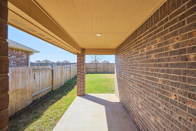 view of patio with a fenced backyard