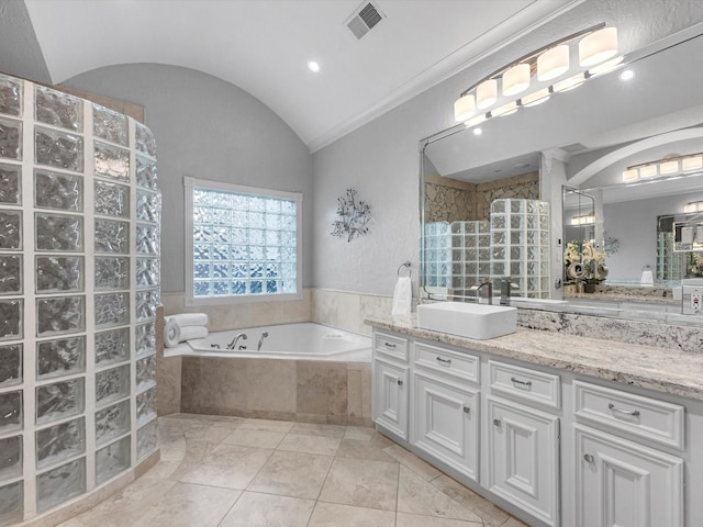 7714 Hertfordshire Dr, Spring, TX 77379 - bathroom with vanity, a bath, a walk in shower, and lofted ceiling