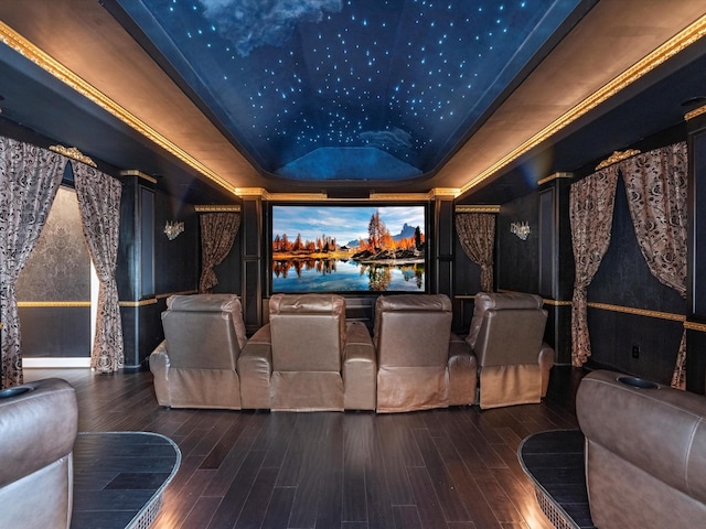 7714 Hertfordshire Dr, Spring, TX 77379 - cinema room featuring a raised ceiling and wood finished floors