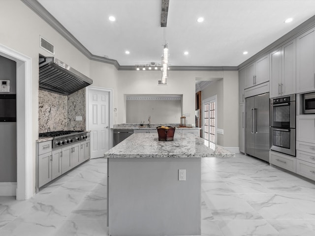 7714 Hertfordshire Dr, Spring, TX 77379 - kitchen with stainless steel appliances, light marble finish floors, gray cabinets, ornamental molding, and recessed lighting