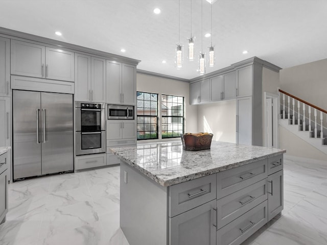 kitchen with recessed lighting, stainless steel appliances, marble finish floor, gray cabinets, and light stone countertops