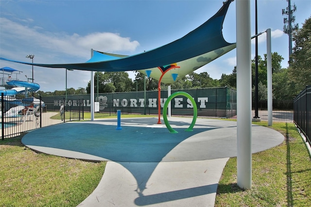 view of home's community with fence