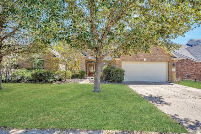 view of front of house with a garage, concrete driveway, brick siding, and a front lawn