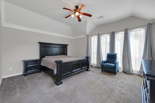 bedroom with visible vents, baseboards, vaulted ceiling, a ceiling fan, and carpet