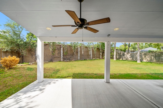 view of patio featuring a fenced backyard and a ceiling fan