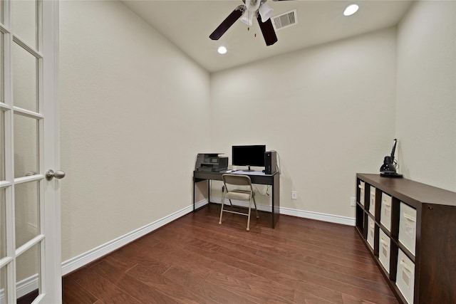 office space featuring dark wood-style floors, visible vents, and baseboards